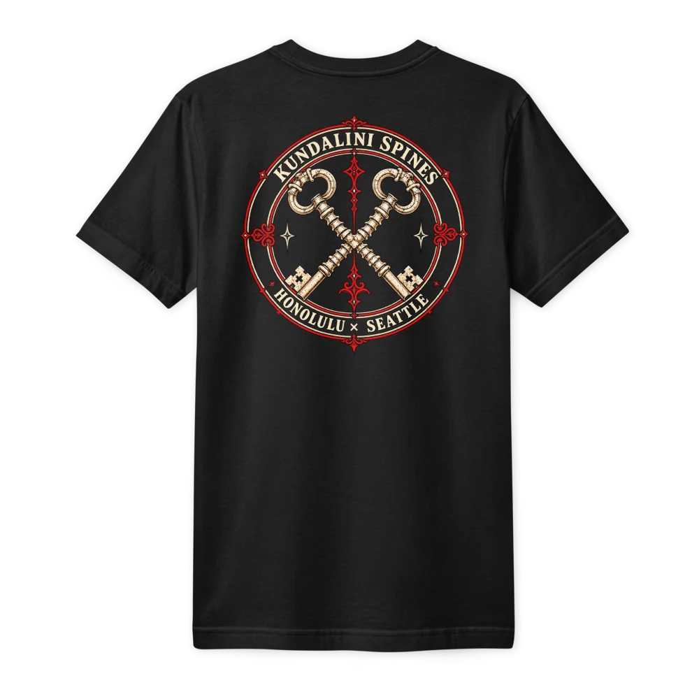 Back of the same black tee: two crossed skeleton keys, their shafts ringed like vertebrae, inside a red and cream seal lettered KUNDALINI SPINES above and HONOLULU &times; SEATTLE below.